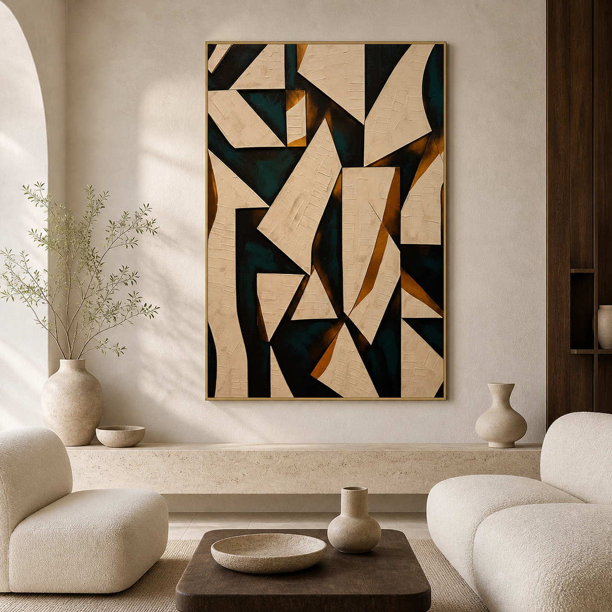 Textured geometric wall art displayed in a warm travertine living room.
