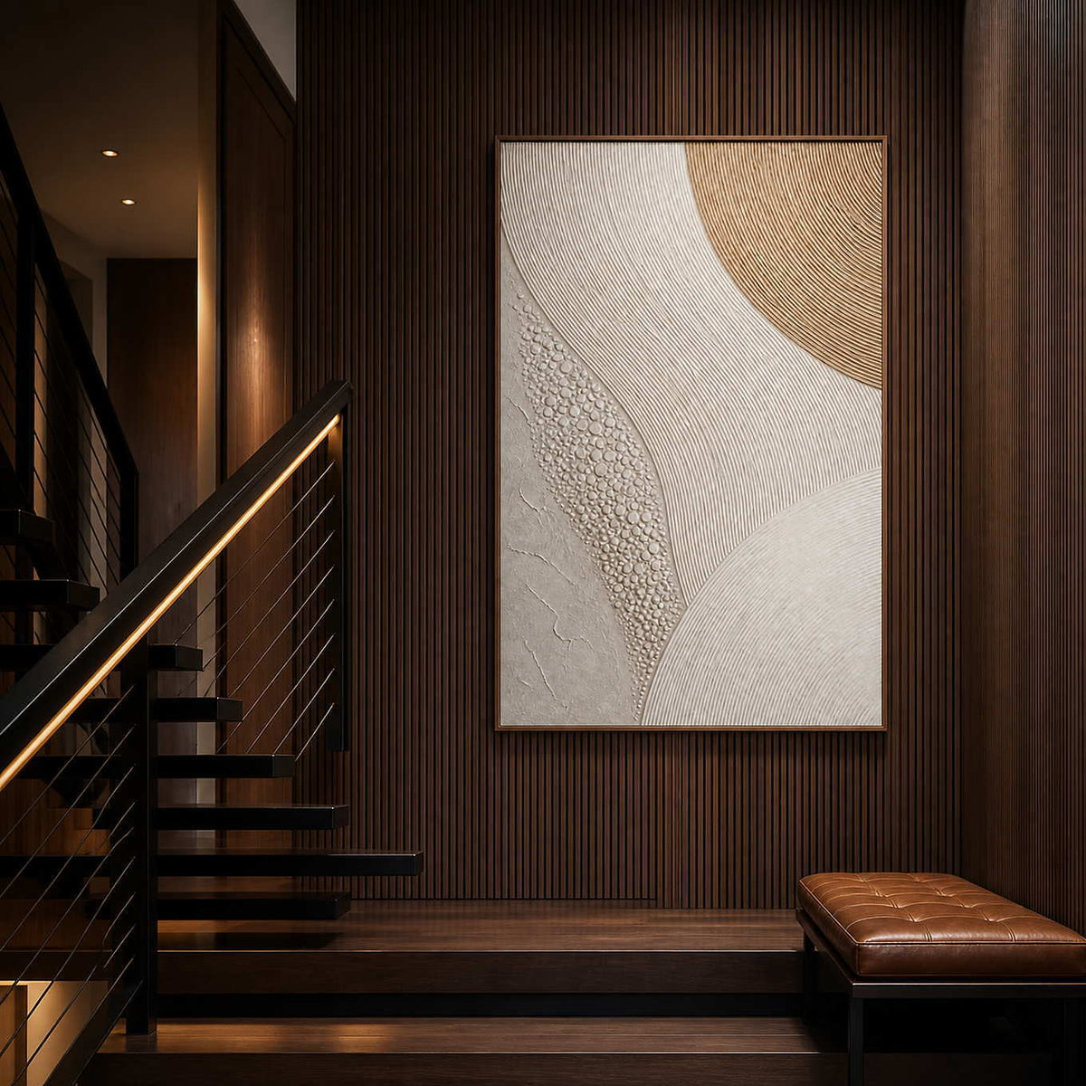 Gold arc rising through ivory curves wall art in a contemporary stair hall.