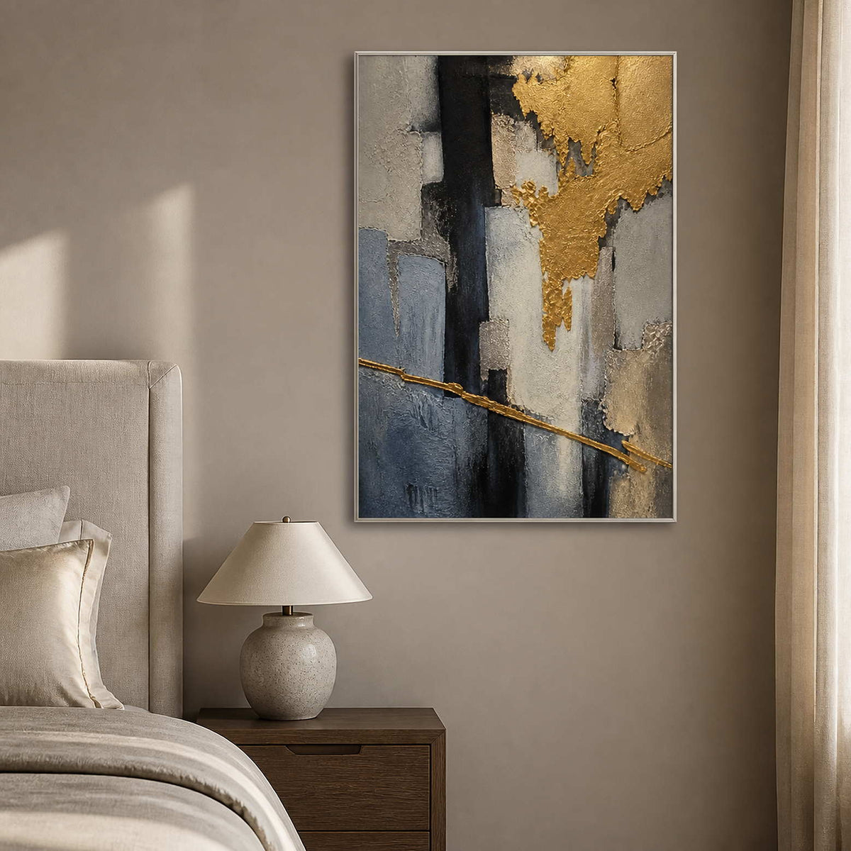 Gold and gray wall art displayed in a serene mushroom-toned bedroom.