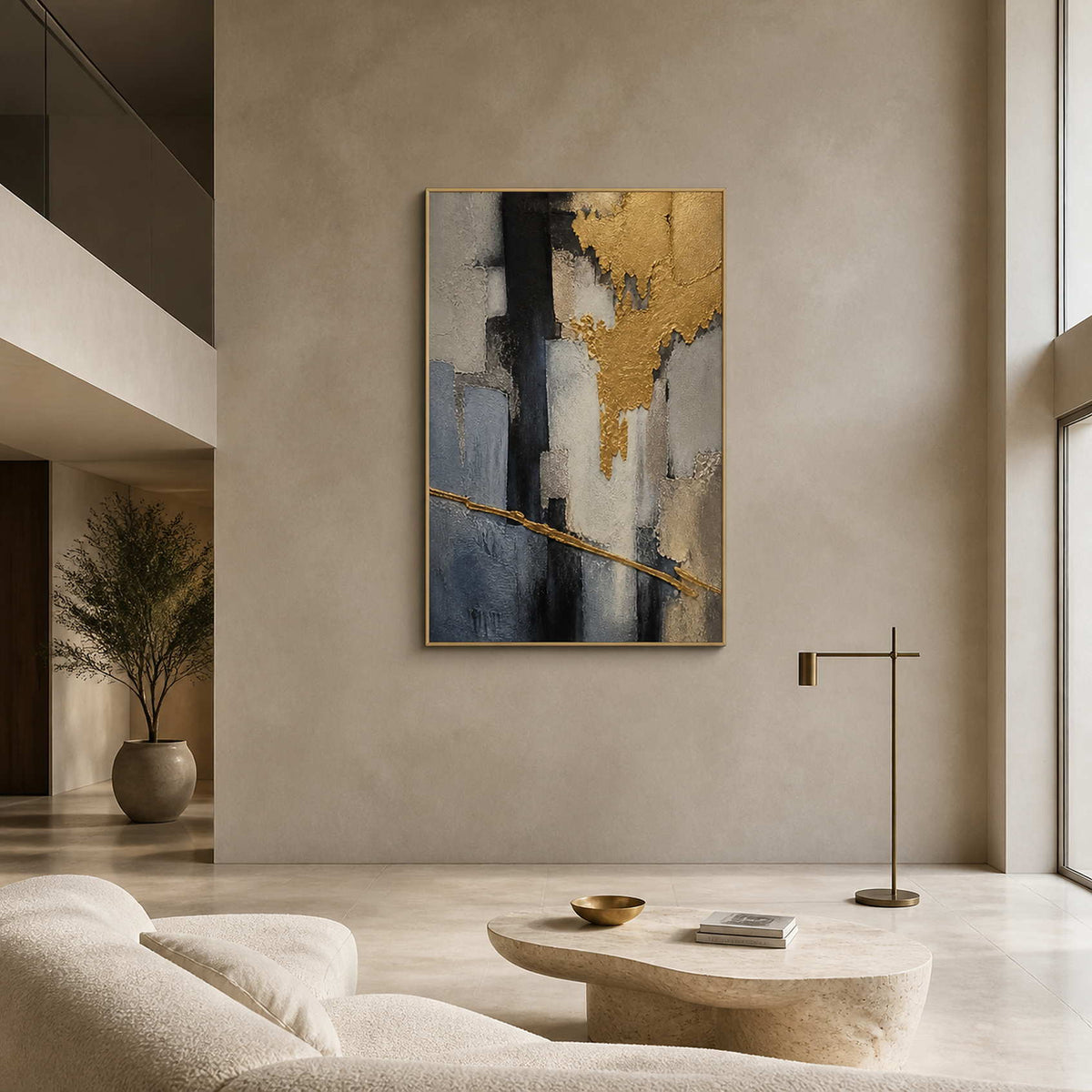 Gold and charcoal textured abstract wall art displayed in a modern living room.
