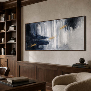 Textured abstract wall art displayed in a refined collector library.