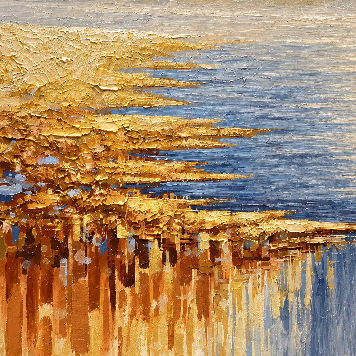 Close-up of layered gold-ochre strokes and vertical drips beside blue horizontal marks.