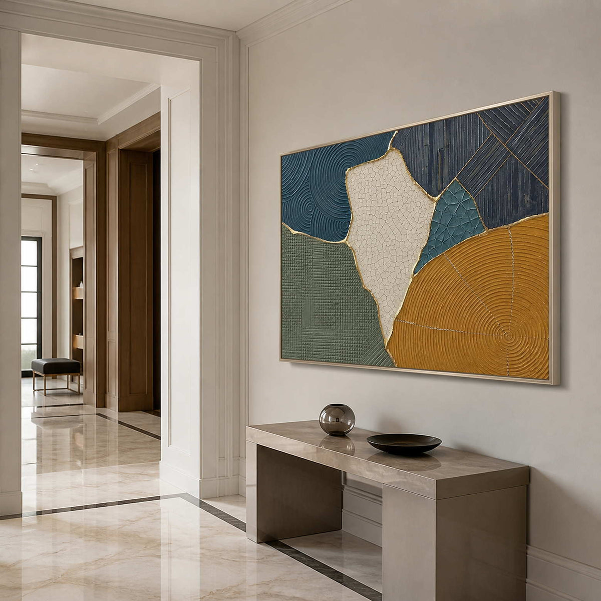 Blue, sage, and ochre artwork styled in a bright entryway.
