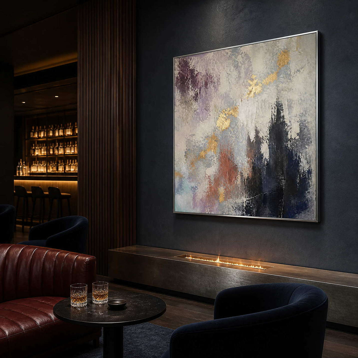 Moody textured abstract wall art in a charcoal blue club lounge.