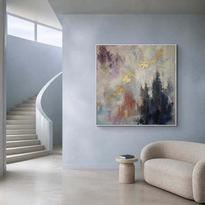 Square textured abstract artwork beside a mist blue modern staircase.