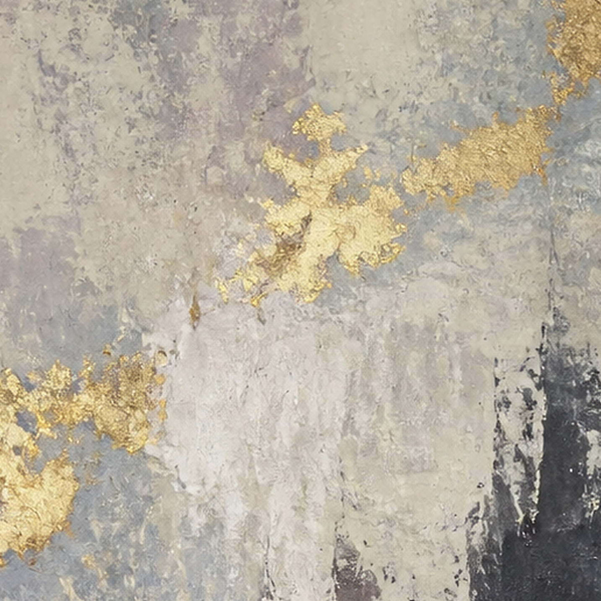 Close-up of broken gold leaf over layered gray painted texture.