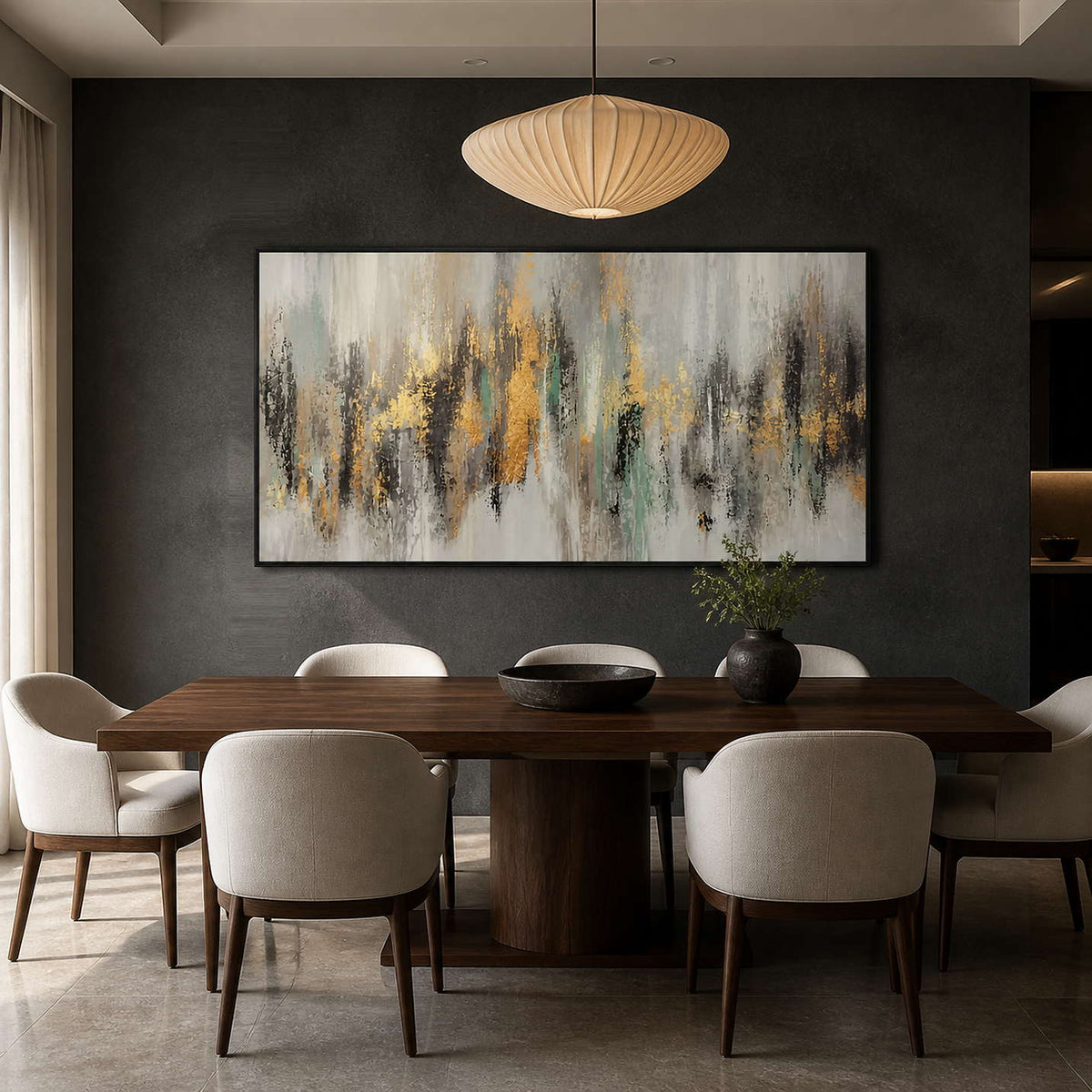 Textured gold abstract painting displayed in a dark graphite dining room.