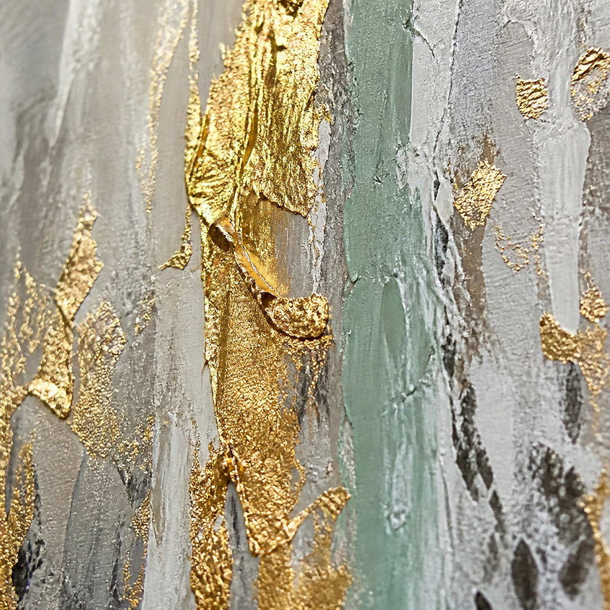 Close-up of raised gold, muted sage, gray, and ivory texture.