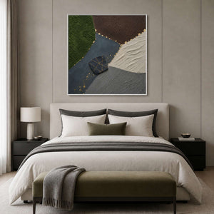 Green and gray textured canvas in a white frame above a bedroom.