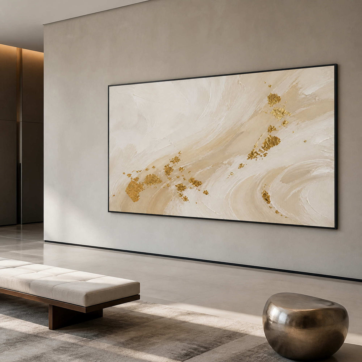 Textured gold abstract wall art displayed in a spacious contemporary hotel lobby.