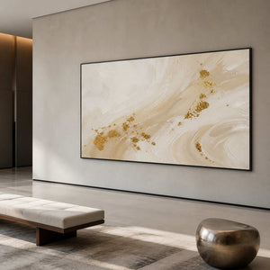Textured gold abstract wall art displayed in a spacious contemporary hotel lobby.