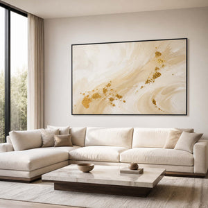 Textured ivory and gold abstract wall art displayed in a modern luxury living room.