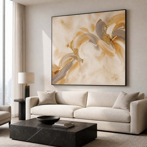 Gold and ivory textured floral wall art in a modern living room.