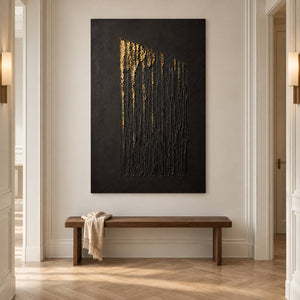 Hand-painted vertical abstract canvas with carved black ridges and gold relief, displayed in a hallway without an outer frame.