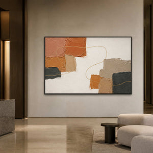 Earth tone abstract wall art displayed in a contemporary hotel lobby.