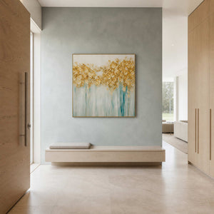 Gold and aqua abstract floral painting displayed in a blue-gray entryway.