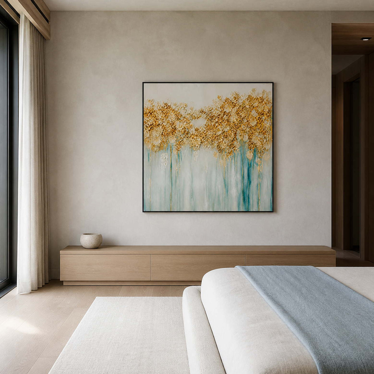 Gold and pale blue botanical painting displayed in a mist-gray bedroom.
