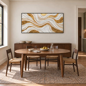 Golden Years in a black frame above a wood sideboard behind a round dining table and woven-seat chairs.