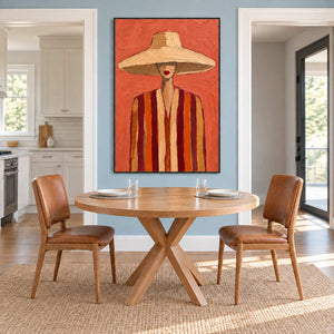 Warm striped portrait behind a round dining table with two brown chairs.