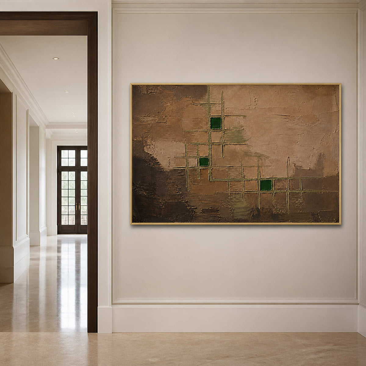 Textured earth tone canvas in a gold frame styled in an entryway.
