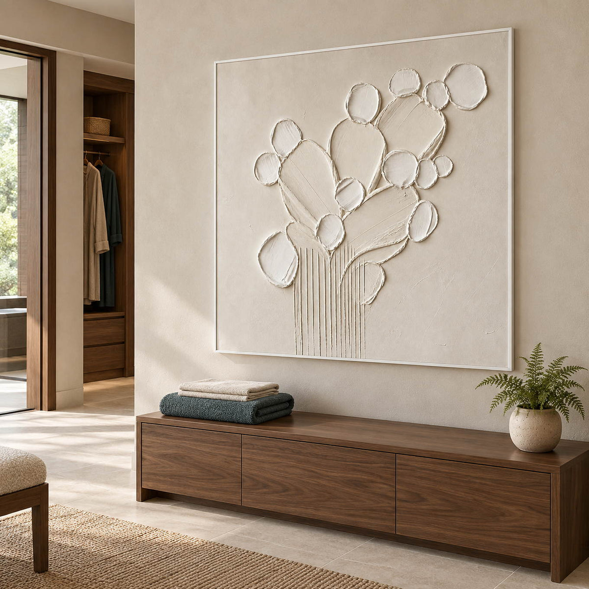 Sculptural warm white petals and leaves raised from a monochrome canvas, displayed in a bathroom dry area in a white frame.