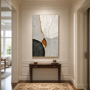 Gold framed abstract painting with fine curved lines above a hallway console.