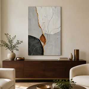 Frameless abstract artwork with fine curves and a gold-toned seam above a living room sideboard.