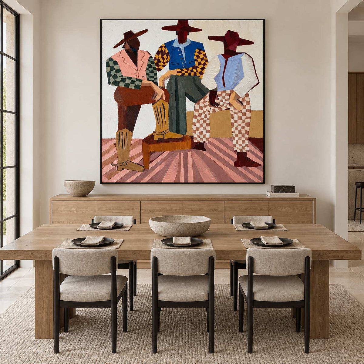 Colorful broad-hatted figures above a light wood dining sideboard and set dining table.