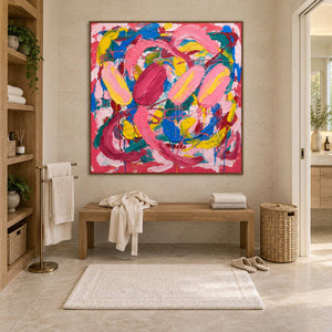 In Full Swing in a brown wood frame above a light wood bench and folded towels in a bathroom dry area.