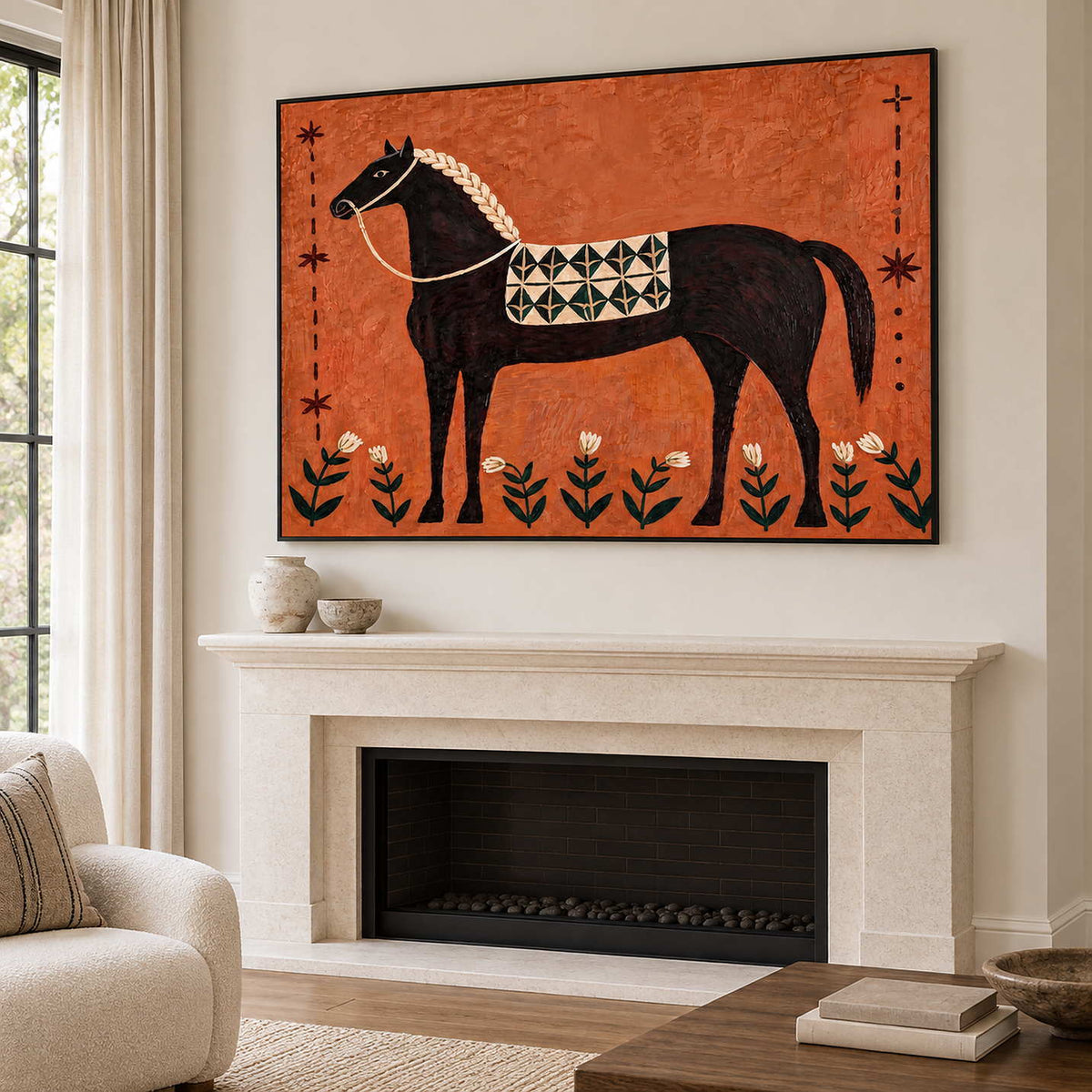 Orange equestrian wall art above a pale fireplace.