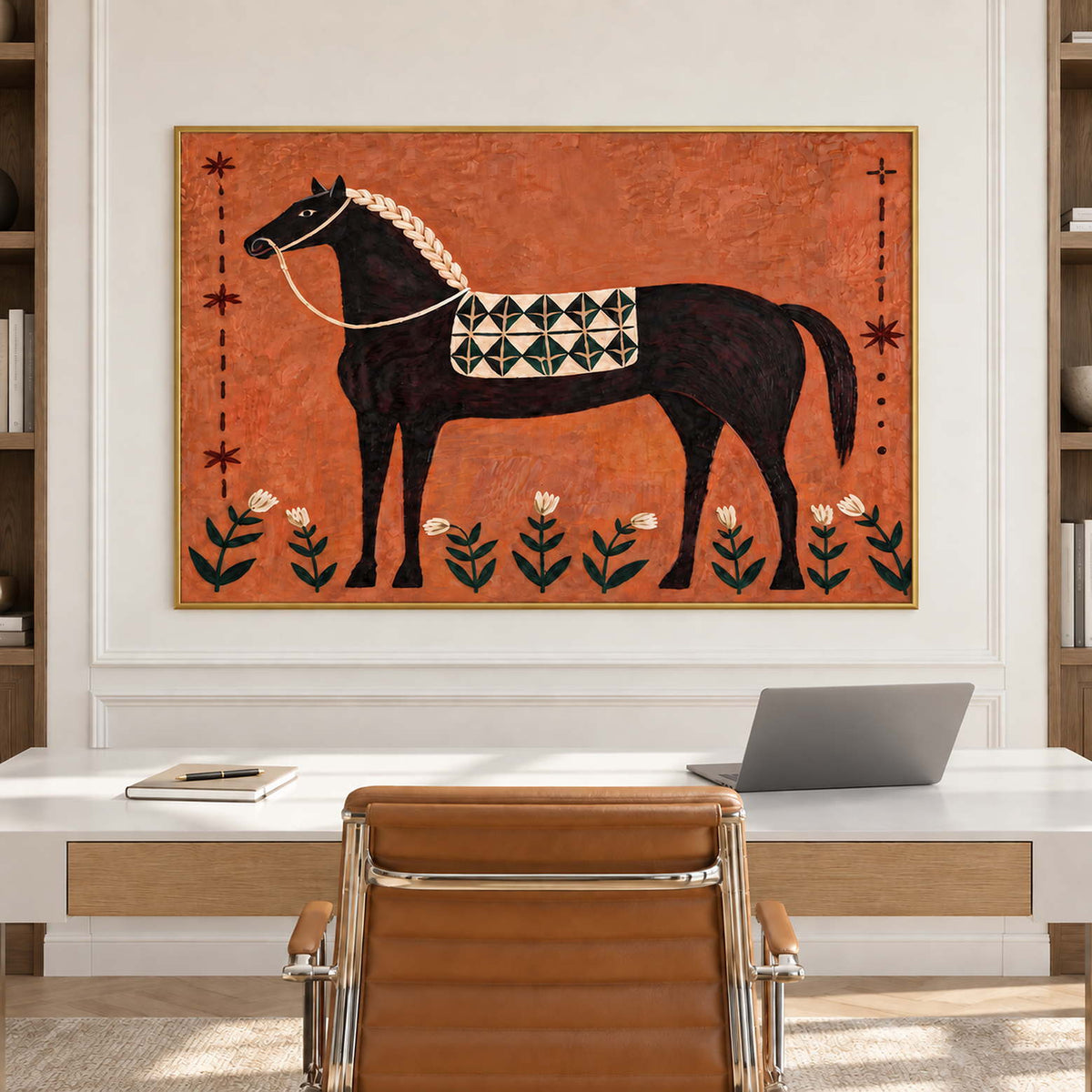 Decorative black-horse artwork above a white desk and brown chair.