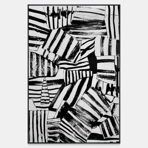 Vertical abstract wall art with tilted black and white stripes and rough brush edges.