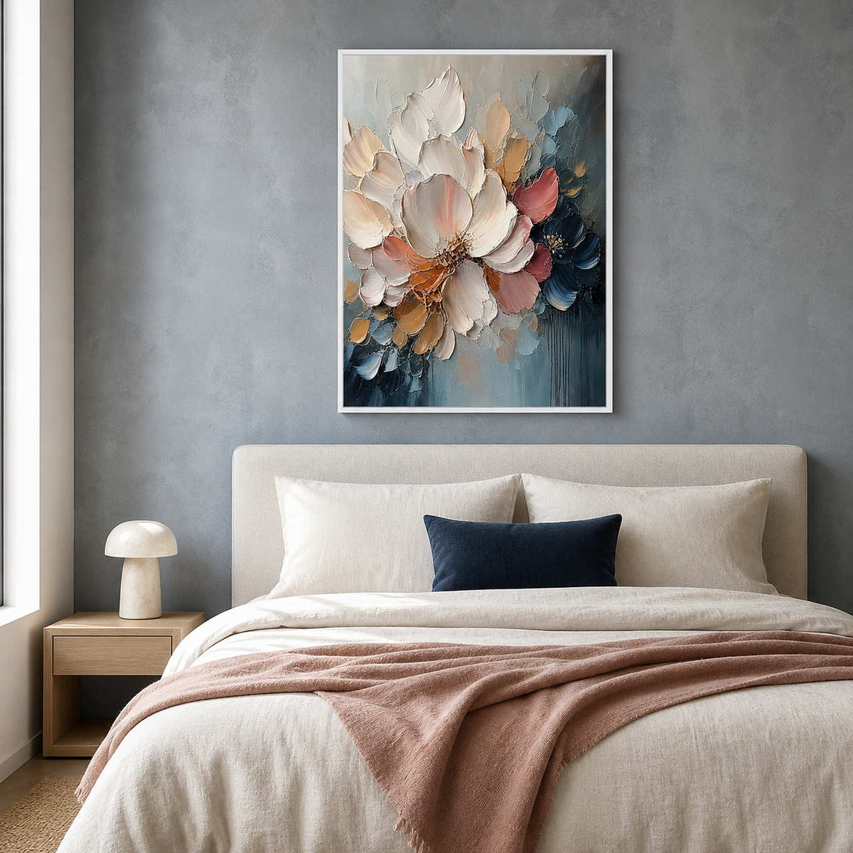 Soft blush and blue floral painting above an ivory bedroom.