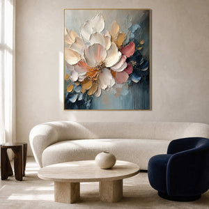 Ivory and navy textured floral wall art in a modern living room.