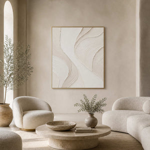 Ivory textured minimalist wall art displayed in a warm gray hotel lounge.