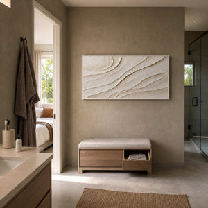 Neutral abstract wall art displayed in a warm modern bathroom.