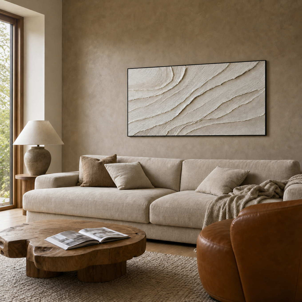 Neutral textured wall art displayed in a warm contemporary living room.