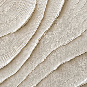 Close-up of layered ivory ridges and finely combed canvas texture.