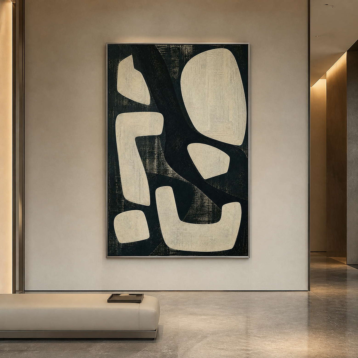 Large modern abstract wall art in a hotel lobby with a silver frame.