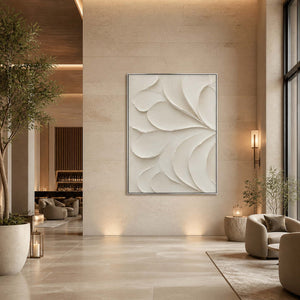 Vertical minimalist wall art displayed in a warm stone boutique hotel lounge.