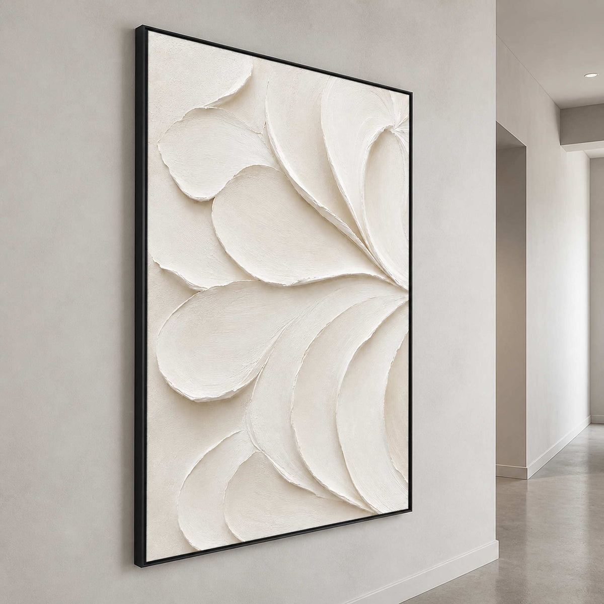 Ivory textured wall art shown from the side in a light gray gallery.