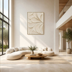 Ivory textured minimalist wall art displayed in a cream double-height living room.