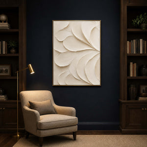 White textured abstract wall art displayed in a deep blue reading room.