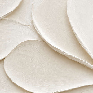 Close-up of layered ivory palette-knife edges and finely combed white paint texture.