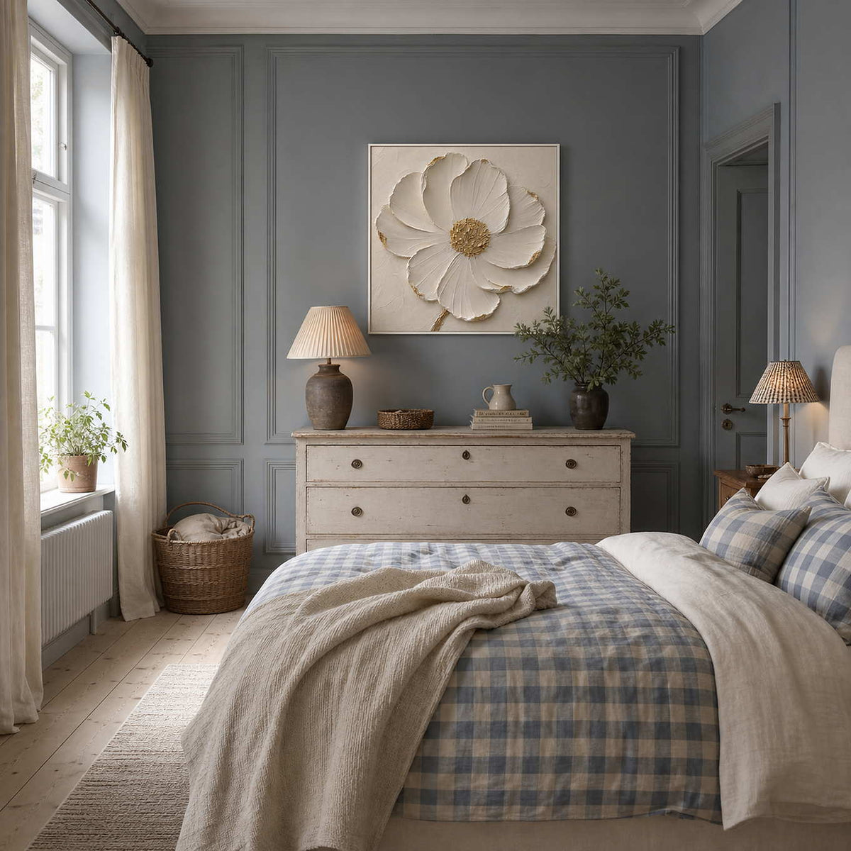 Textured ivory flower wall art displayed above a dresser in a serene bedroom.
