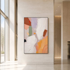 Minimalist textured abstract wall art displayed in a bright hotel lobby.
