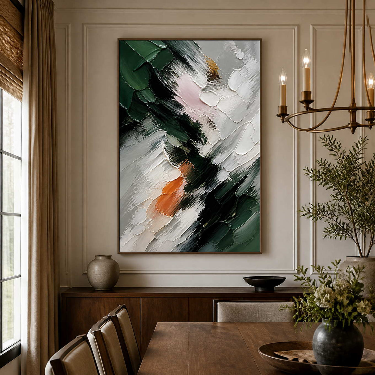 Textured green abstract artwork brings sculptural movement to an elegant dining room.