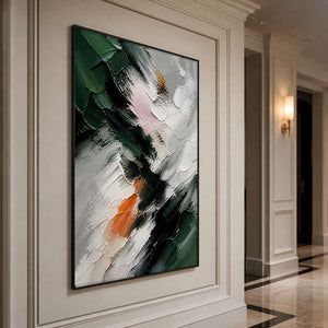 Green and ivory abstract wall art displayed along a bright contemporary hallway.