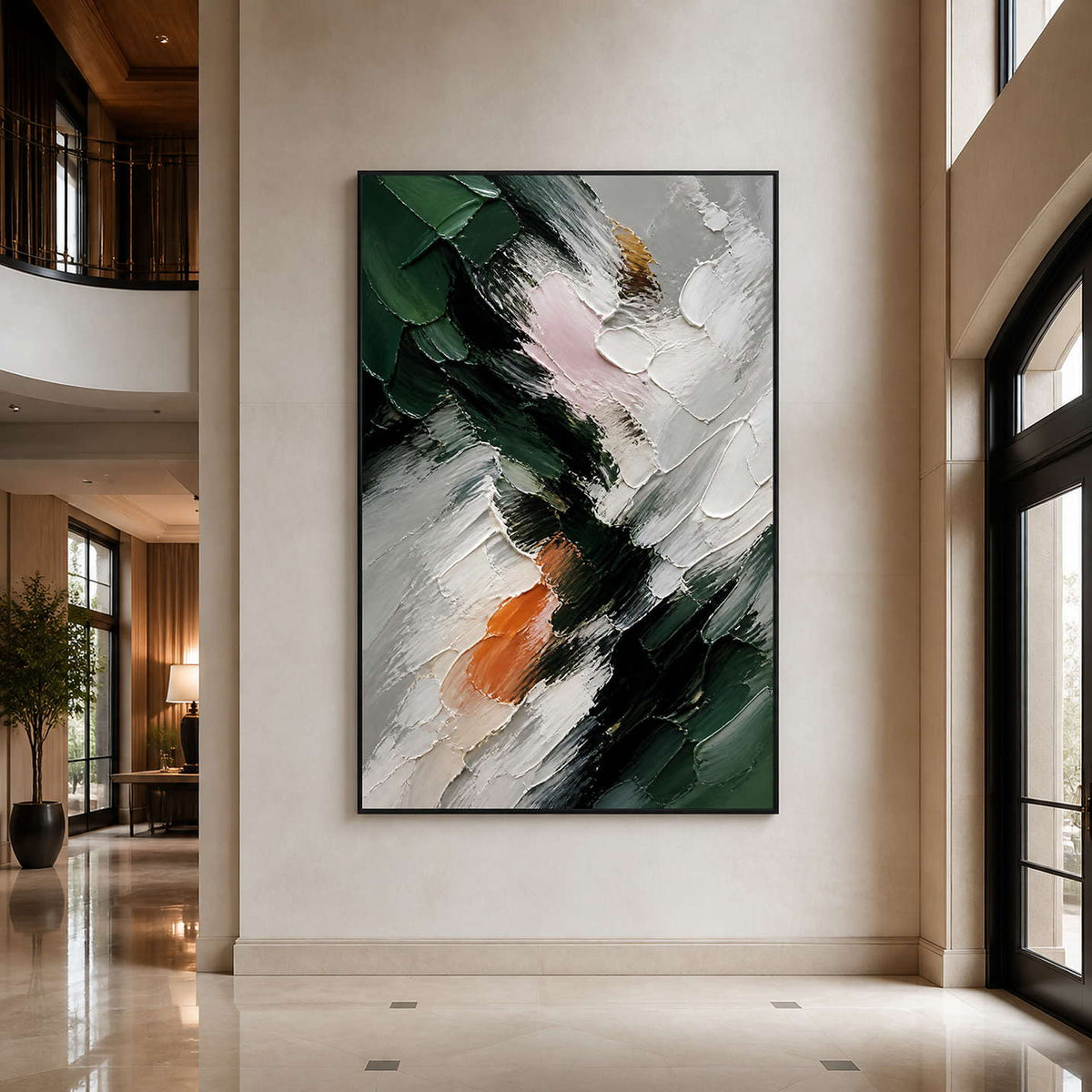 Bold green and ivory abstract painting in a spacious contemporary hotel lobby.