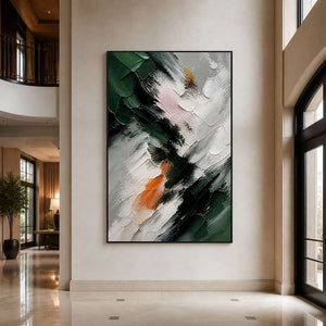 Bold green and ivory abstract painting in a spacious contemporary hotel lobby.